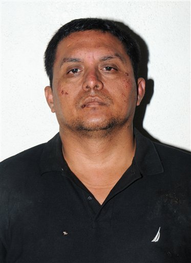 En esta foto publicada el 16 de julio de 2013 por la Armada de México aparece el líder del cartel de los Zetas Miguel Ángel Treviño Morales tras su arresto en México. (Foto AP/Armada de México)