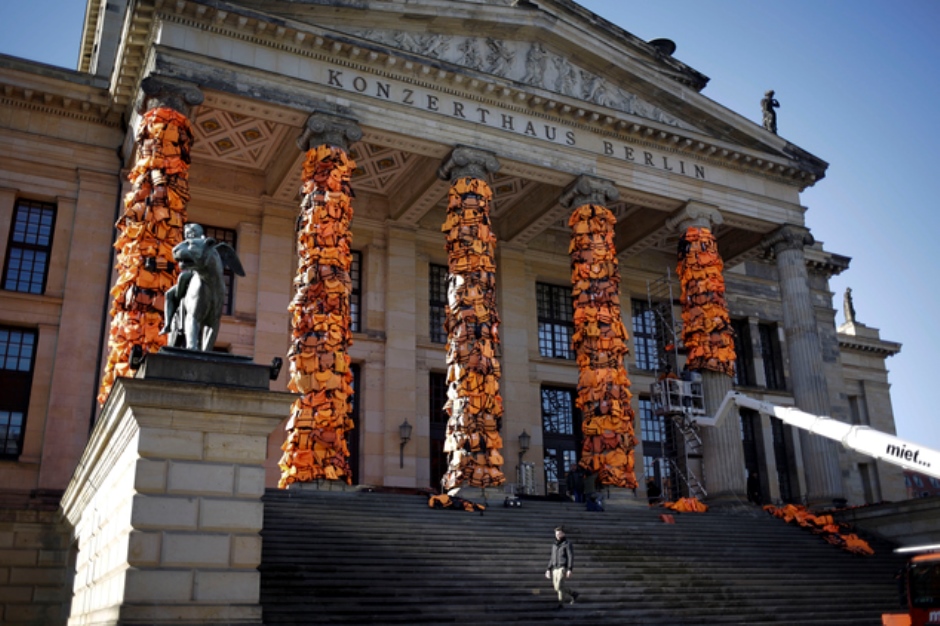 A art installation by Chinese artist Ai Weiwei with discarded life jackets collected at the Greek island Lesbos is set up at the Konzerthalle Berlin (Concert Hall Berlin) for the Cinema For Peace gala alongside the 2016 Berlinale Film Festival in Berlin, Saturday, Feb. 13, 2016. The charity gala will take place at the Konzerthaus at the Gendarmen Markt place on Monday, Feb. 15, 2016. (AP Photo/Markus Schreiber)