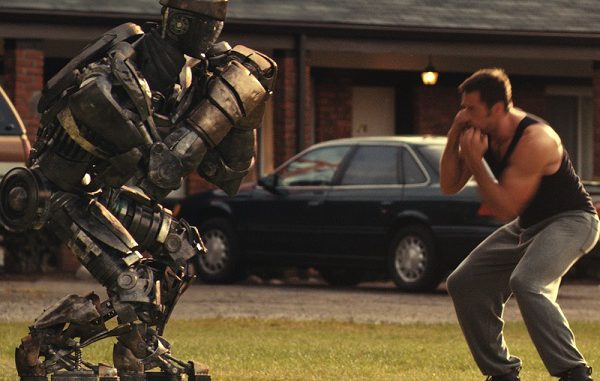 "REAL STEEL"FF-001Down-on-his-luck fight promoter Charlie (Hugh Jackman) trains his star robot boxer Atom for a chance to go to the big time in the high-tech boxing world in DreamWorks Pictures' action drama "Real Steel."©DreamWorks II Distribution Co., LLC. All Rights Reserved.