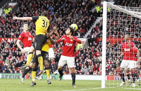 Blackburn Rovers' Hanley heads the ball to score his side's third goal against Manchester United in Manchester