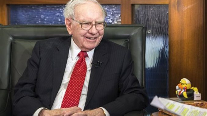 Warreb Buffett subasta