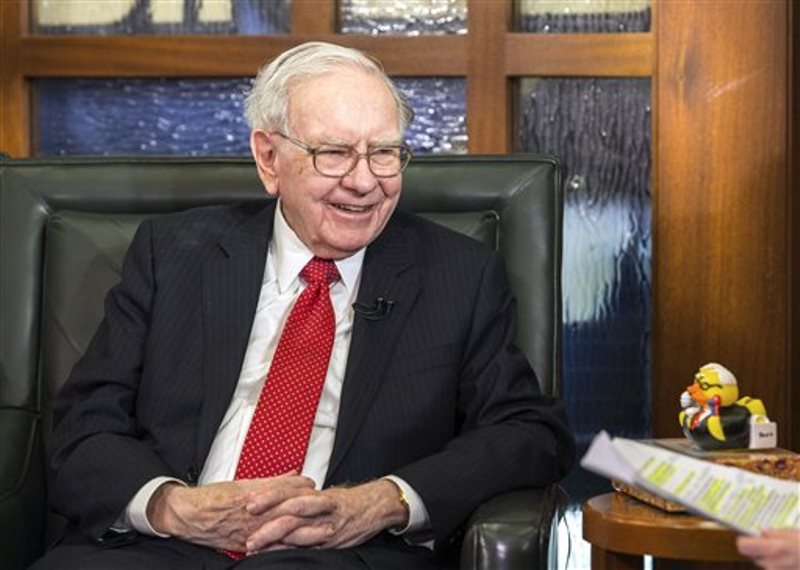 Warreb Buffett subasta