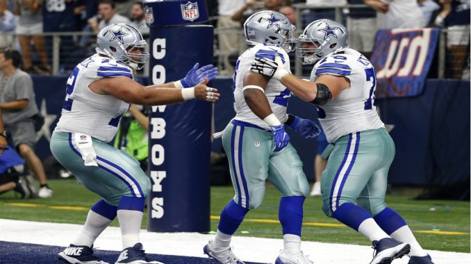 Travis Frederick, Zack Martin, Ezekiel Elliott