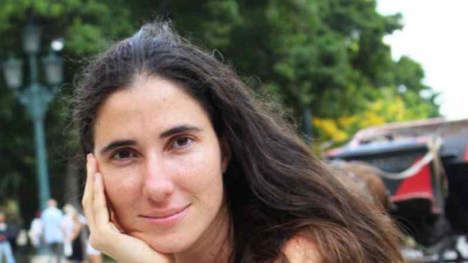 yoanisanchez-mano-en-la-cara