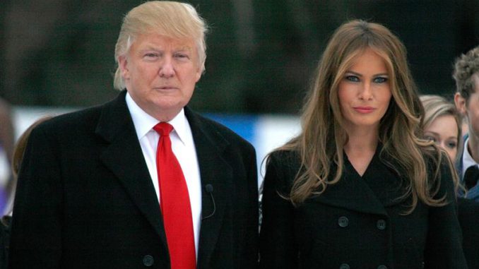 Donald y Melanie de abrigo