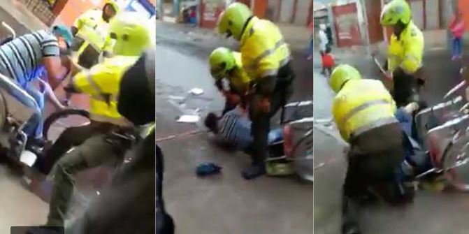 policia golpea colombia