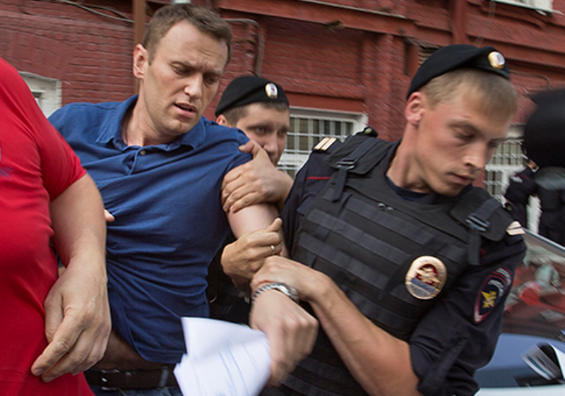 Police-officers-detain-Russian-opposition-leader-Alexei-Navalny-AP