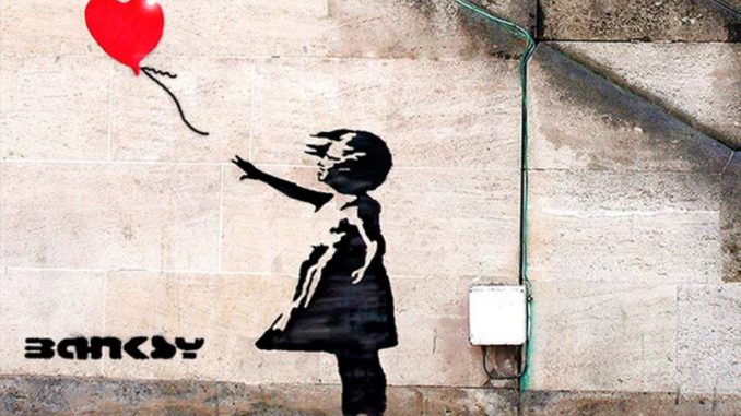 niña-on-corazon-de-banksy