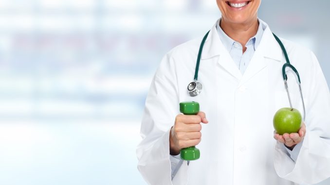 doctor con manzana
