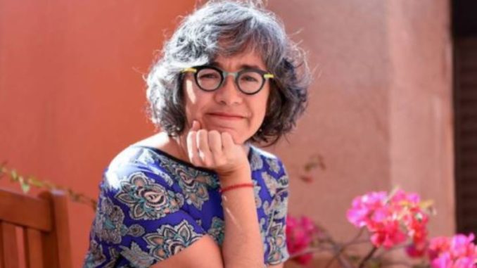 Cristina Rivera Rosi con flores