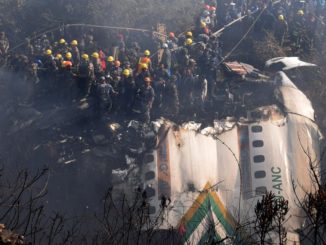 Pokhara (Nepal), 14/01/2023.- Rescue teams working near the wreckage at the crash site of a Yeti Airlines ATR72 aircraft in Pokhara, central Nepal, 15 January 2023. A Yeti Airlines ATR72 aircraft carrying 72 people on board, 68 passengers and 4 crew members, crashed into a gorge while trying to land at the Pokhara International Airport. According to a statement from the Civil Aviation Authority of Nepal (CAAN), at least 68 people were confirmed dead. EFE/EPA/KRISHNA MANI BARAL