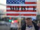 Tel Aviv (Israel), 15/04/2023.- A demonstrator holds a placard during a protest against the justice system reform in Tel Aviv, Israel, 15 April 2023. Mass protests continue across the country against the government justice system reform plan. (Protestas) EFE/EPA/ABIR SULTAN