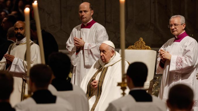 Pope Francis leads the Midnight Christmas mass at the Vatican