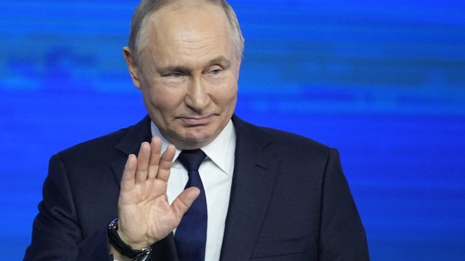 Putin attends meeting with representatives at election headquarters in Moscow