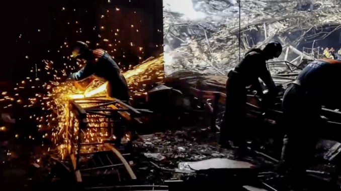 Russian rescuers clear the rubble and extinguish fires at Moscow's Crocus City Hall