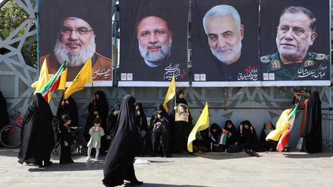 Iranians rally in Tehran following Iran's missile attack against Israel