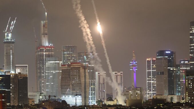Israel's Iron Dome intercepts ballistic missiles fired from Iran over Tel Aviv